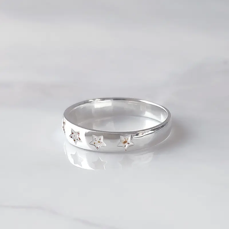 Anillo de plata · Estrellas con partículas de cordón umbilical