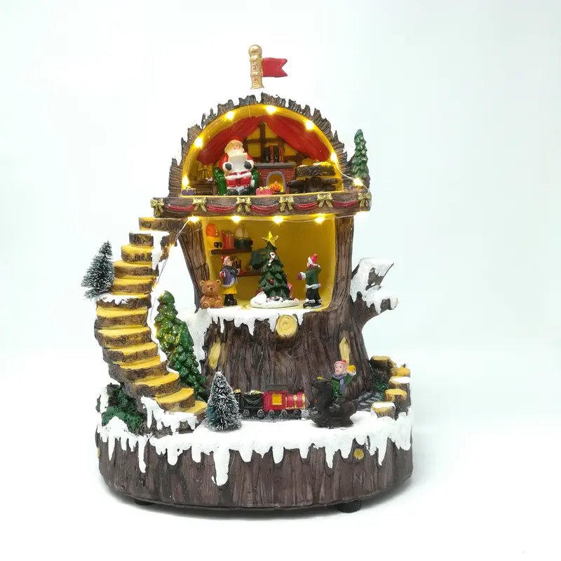 Casa di Babbo Natale nell'Albero con Treno che Gira