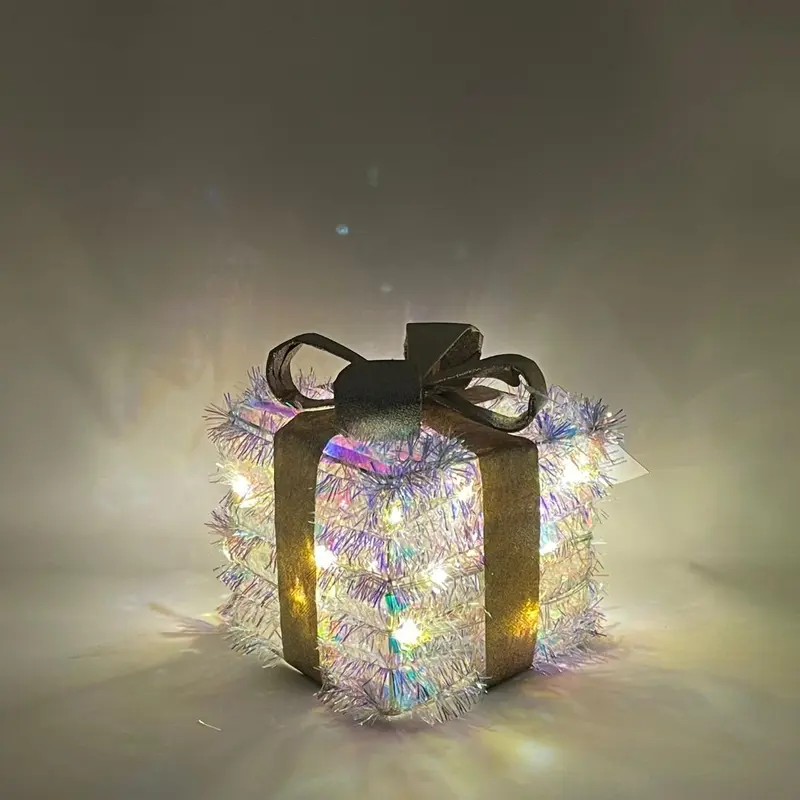 Pacco regalo luminoso in PET con LED bianco caldo