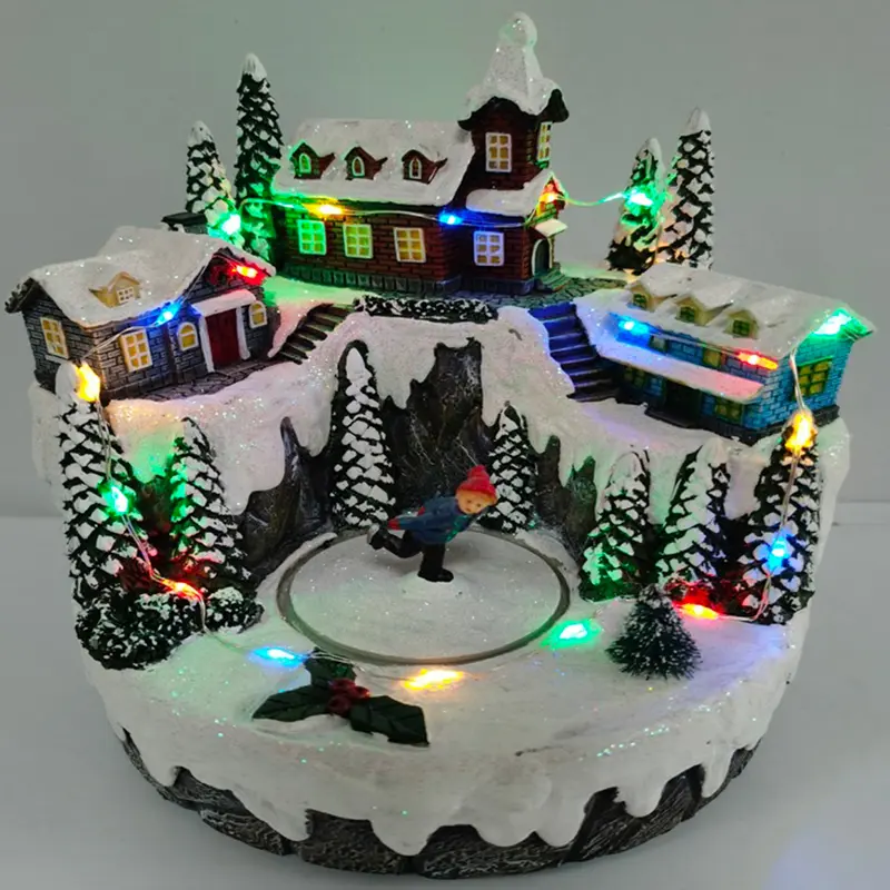 Villaggio con Pattinatore - Carillon di Natale con neve