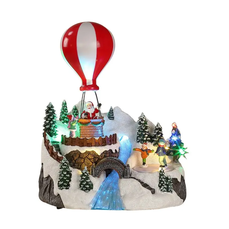 Villaggio natalizio con mongolfiera e LED H26 cm doppio movimento