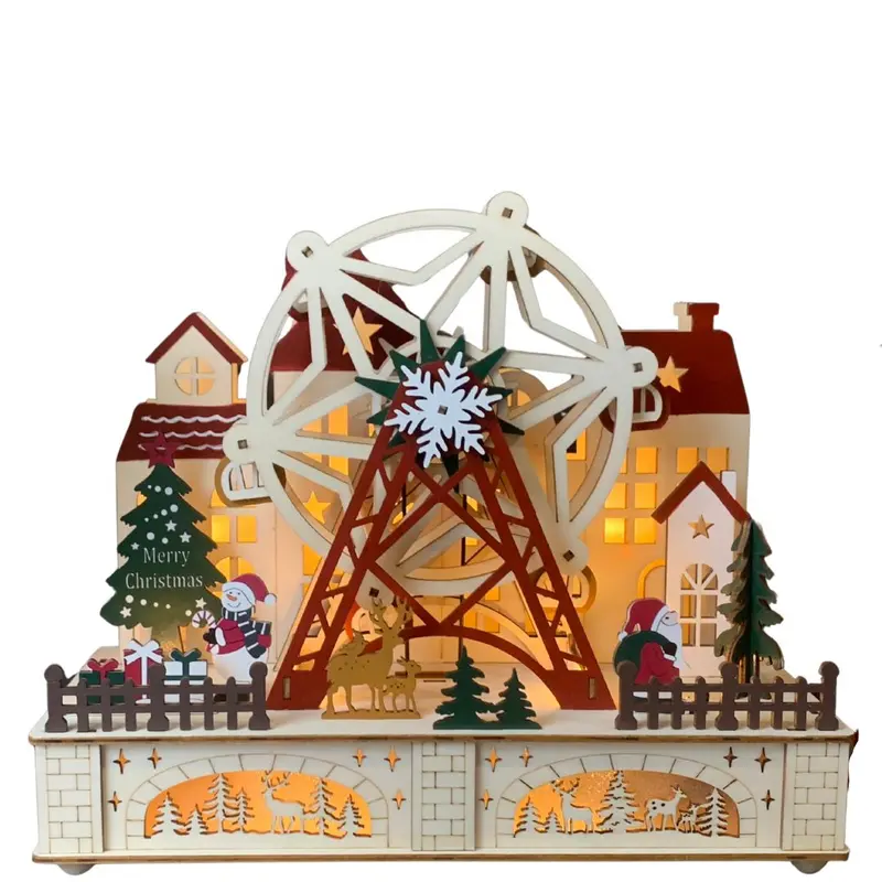 Villaggio natalizio in legno con ruota panoramica e luci